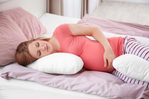 как лучше спать во время беременности